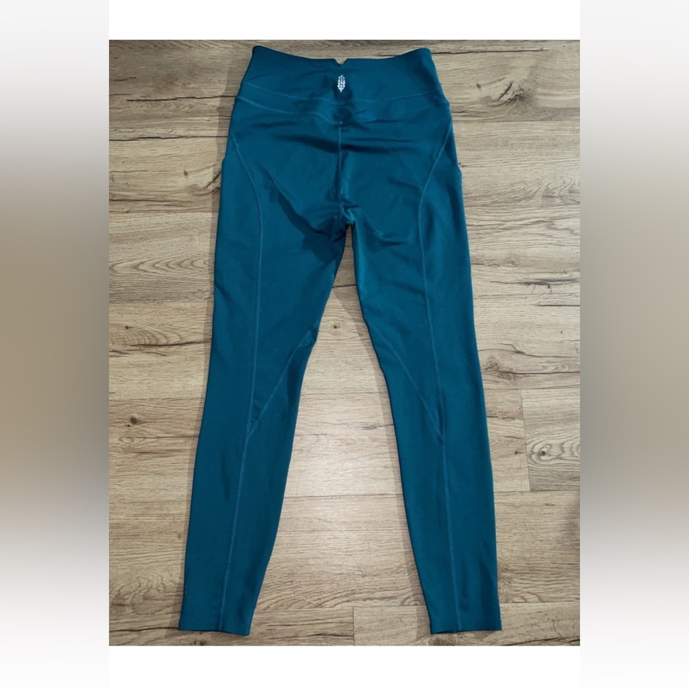 Free People Movement Leggings Women's Small teal Pockets Split Hem Athletic Fp